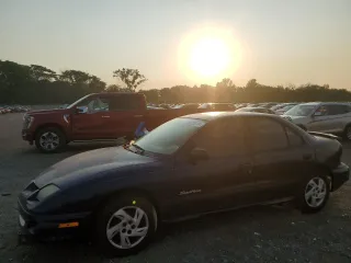 2002 Pontiac Sunfire SE z VIN 1G2JB524527472995, wystawiony jako Copart lot #63125134 z przebiegiem 121 055 mil mil oraz Nie do naprawy • Non repairable. Historia ofert i sprzedaży dostępna na DreamBid. Obrazek 1.