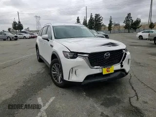 2024 Mazda CX-90 Select z VIN JM3KKAHD5R1187895, wystawiony jako Copart lot #53903385 z przebiegiem 4 639 mil mil oraz Szkoda całkowita • Salvage title. Historia ofert i sprzedaży dostępna na DreamBid. Obrazek 14.