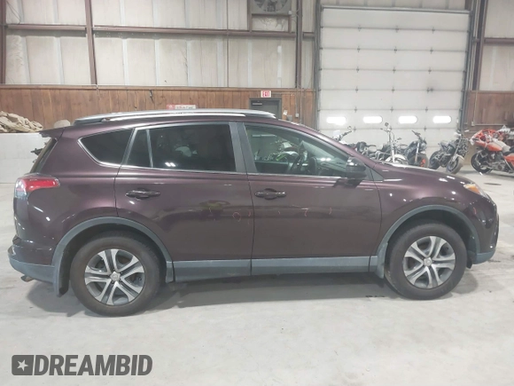 2018 Toyota RAV4 LE with VIN 2T3BFREV0JW759714, listed as a IAAI auction lot 41823084 with 119,909 mi miles and . Bid and sale history available at DreamBid. Image 13.