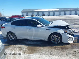 2016 Kia Optima SXL Turbo with VIN 5XXGV4L23GG073151, listed as a IAAI auction lot 41363341 with 74,226 mi miles. Bid and sale history available at carsss.com. Image 13.