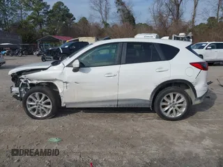 2014 Mazda CX-5 Grand Touring with VIN JM3KE4DY0E0343777, listed as a IAAI auction lot 41464395 with 126,214 mi miles. Bid and sale history available at carsss.com. Image 14.