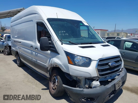 2020 Ford Transit Cargo z VIN 1FTBW3X89LKB72069, wystawiony jako IAAI lot #42623407 z przebiegiem 454 279 mil mil oraz . Historia ofert i sprzedaży dostępna na DreamBid. Obrazek 1.