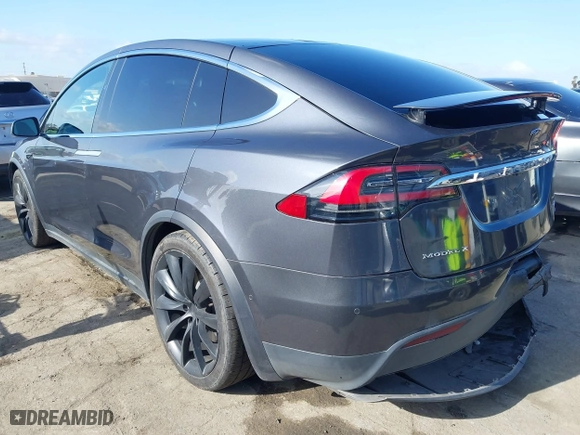2018 Tesla Model X 75D with VIN 5YJXCBE22JF124270, listed as a IAAI auction lot 41909734 with 92,553 mi miles. Bid and sale history available at carsss.com. Image 3.