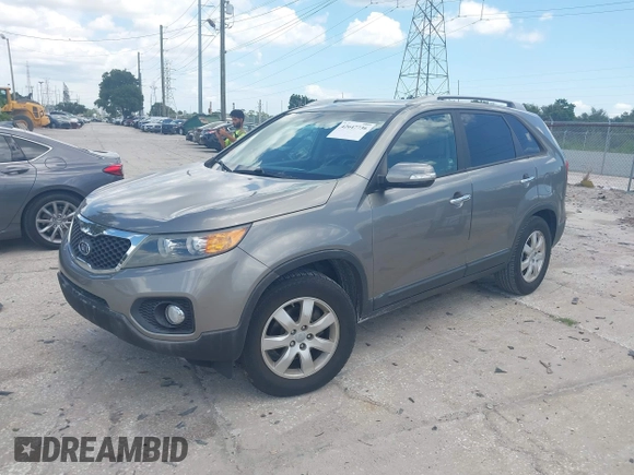 2013 Kia Sorento LX with VIN 5XYKT3A62DG322174, listed as a IAAI auction lot 42647736 with 92,389 mi miles and . Bid and sale history available at DreamBid. Image 2.