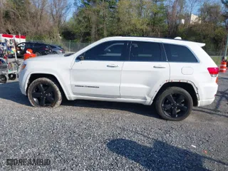 2015 Jeep Grand Cherokee Altitude with VIN 1C4RJFAG1FC797157, listed as a IAAI auction lot 42021139 with 148,491 mi miles. Bid and sale history available at carsss.com. Image 14.