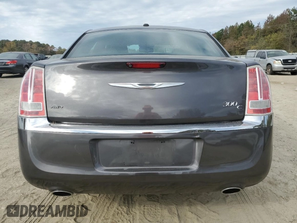 2014 Chrysler 300 C with VIN 2C3CCAKT6EH109281, listed as a Copart auction lot 79534984 with 183,148 mi miles and Salvage Title. Bid and sale history available at DreamBid. Image 6.