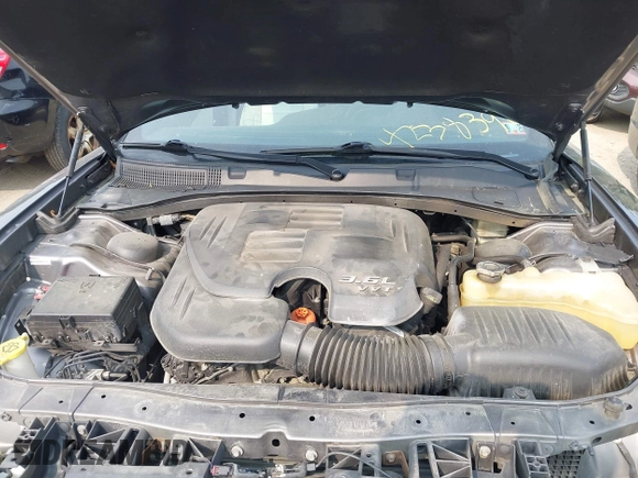 2015 Dodge Charger SXT with VIN 2C3CDXHGXFH897395, listed as a IAAI auction lot 42383907 with 145,334 mi miles and . Bid and sale history available at DreamBid. Image 10.