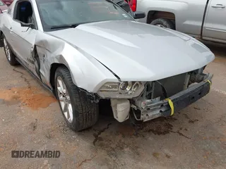 2011 Ford Mustang V6 with VIN 1ZVBP8AMXB5142041, listed as a IAAI auction lot 41938438 with 126,591 mi miles and . Bid and sale history available at carsss.com. Image 6.