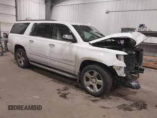 2015 Chevrolet Suburban LT with VIN 1GNSKJKC7FR716745, listed as a IAAI auction lot 41370063 with 212,380 mi miles and . Bid and sale history available at DreamBid. Image 1.