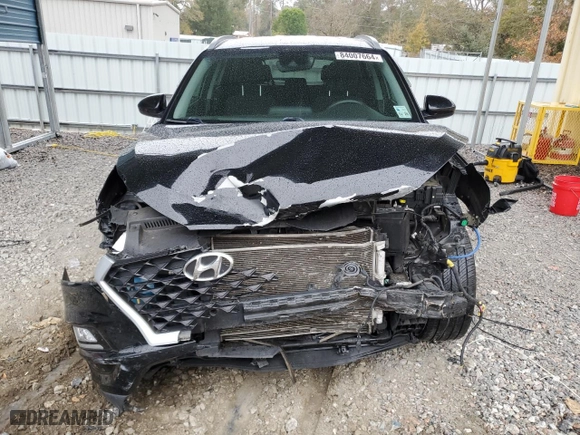 2020 Hyundai Tucson Sport with VIN KM8J33AL3LU238987, listed as a Copart auction lot 84007664 with 77,244 mi miles and Salvage Title. Bid and sale history available at carsss.com. Image 5.