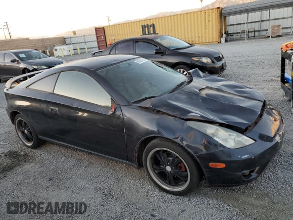 2004 Toyota Celica GT with VIN JTDDR32T040168744, listed as a Copart auction lot 85504754 with 210,919 mi miles and Clean Title. Bid and sale history available at DreamBid. Image 4.