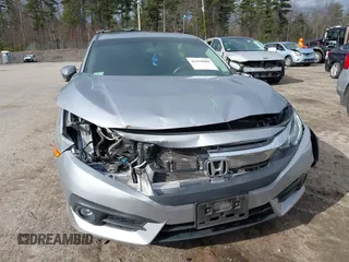 2018 Honda Civic EX-T z VIN 2HGFC1F34JH641837, wystawiony jako IAAI lot #41858089 z przebiegiem 65 318 mil mil oraz . Historia ofert i sprzedaży dostępna na DreamBid. Obrazek 6.