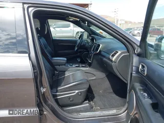 2014 Jeep Grand Cherokee Summit with VIN 1C4RJFJM5EC377129, listed as a IAAI auction lot 41763932 with 187,561 mi miles and . Bid and sale history available at DreamBid. Image 5.