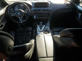 2014 BMW M6 z VIN WBS6C9C51ED466932, wystawiony jako Copart lot #43934385 z przebiegiem 116 375 mil mil oraz Szkoda całkowita • Salvage title. Historia ofert i sprzedaży dostępna na DreamBid. Obrazek 8.
