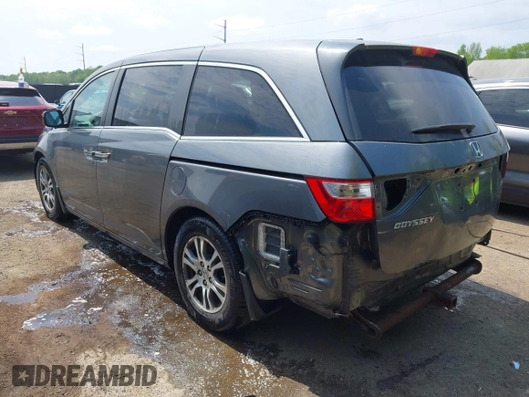 2012 Honda Odyssey EX-L with VIN 5FNRL5H67CB041252, listed as a IAAI auction lot 42158494 with 152,940 mi miles and . Bid and sale history available at DreamBid. Image 3.