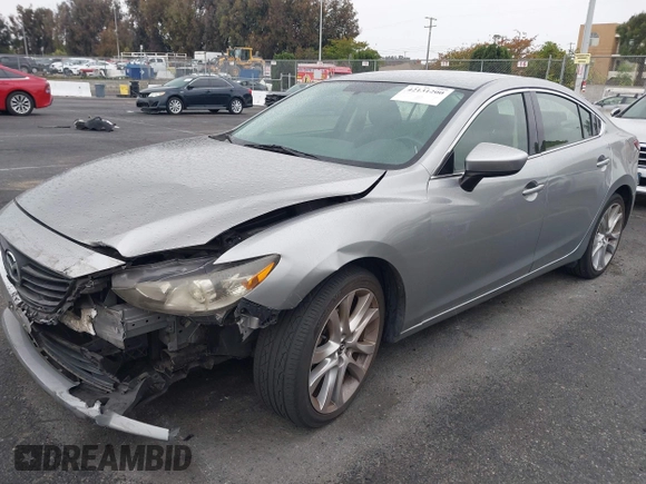 2014 Mazda 6 i Touring with VIN JM1GJ1V60E1141831, listed as a IAAI auction lot 42131200 with 86,597 mi miles and . Bid and sale history available at DreamBid. Image 17.