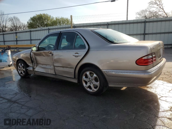 2002 Mercedes-Benz E-Class with VIN WDBJF65J22B490275, listed as a Copart auction lot 51128565 with 142,232 mi miles and Salvage Title. Bid and sale history available at carsss.com. Image 2.