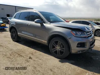 2013 Volkswagen Touareg Sport с VIN WVGEP9BP0DD010408, выставлен на аукционе Copart как лот 75854084 с пробегом 159 863 миль миль и Списание • Salvage title. История ставок и продаж доступна на DreamBid. Изображение 4.