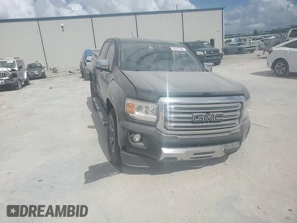 2015 GMC Canyon 2WD SLT with VIN 1GTG5CE31F1263234, listed as a Copart auction lot 76512794 with 113,180 mi miles and Salvage Title. Bid and sale history available at carsss.com. Image 13.