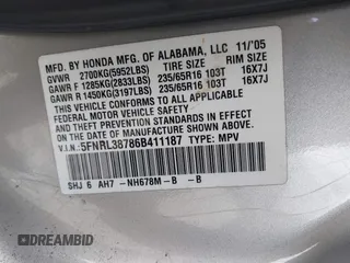 2006 Honda Odyssey EX-L z VIN 5FNRL38786B411187, wystawiony jako IAAI lot #42316075 z przebiegiem 272 658 mil mil oraz . Historia ofert i sprzedaży dostępna na DreamBid. Obrazek 9.