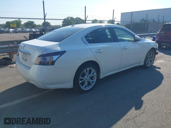2014 Nissan Maxima S with VIN 1N4AA5AP2EC909749, listed as a IAAI auction lot 42456426 with 185,554 mi miles and . Bid and sale history available at DreamBid. Image 4.
