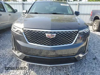 2021 Cadillac XT6 Premium Luxury with VIN 1GYKPCRS1MZ199288, listed as a Copart auction lot 54264995 with 51,432 mi miles and Salvage Title. Bid and sale history available at carsss.com. Image 5.