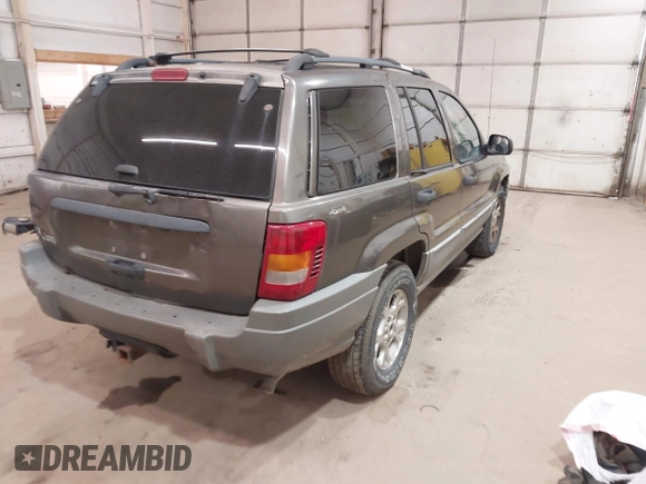 2000 Jeep Grand Cherokee Laredo z VIN 1J4GW48S1YC277710, wystawiony jako IAAI lot #42033564 z przebiegiem Nie podano mil oraz . Historia ofert i sprzedaży dostępna na DreamBid. Obrazek 4.