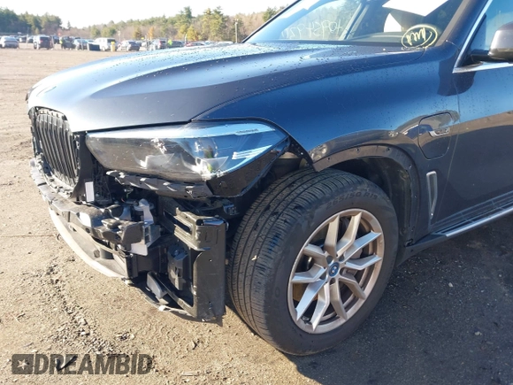 2022 BMW X5 xDrive45e with VIN 5UXTA6C05N9K75681, listed as a IAAI auction lot 40954930 with 13,463 mi miles. Bid and sale history available at carsss.com. Image 19.