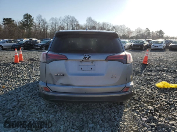 2018 Toyota RAV4 LE with VIN JTMBFREV4JD251520, listed as a Copart auction lot 48574485 with 133,079 mi miles and Salvage Title. Bid and sale history available at carsss.com. Image 6.