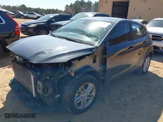 2021 Hyundai Kona SE with VIN KM8K12AA1MU705988, listed as a IAAI auction lot 41665055 with 52,719 mi miles. Bid and sale history available at carsss.com. Image 2.