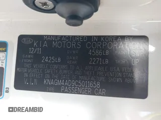 2012 Kia Optima Hybrid with VIN KNAGM4AD9C5011658, listed as a IAAI auction lot 42197129 with 142,977 mi miles. Bid and sale history available at carsss.com. Image 9.