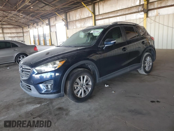 2016 Mazda CX-5 Touring with VIN JM3KE2CY7G0653854, listed as a Copart auction lot 74825564 with 139,193 mi miles and Salvage Title. Bid and sale history available at DreamBid. Image 1.