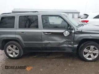 2013 Jeep Patriot Latitude with VIN 1C4NJPFB8DD129848, listed as a IAAI auction lot 40949386 with 168,839 mi miles and . Bid and sale history available at carsss.com. Image 13.