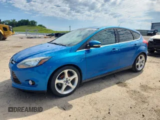 2014 Ford Focus Titanium with VIN 1FADP3N21EL198009, listed as a Copart auction lot 61939335 with 133,792 mi miles and Clean title. Bid and sale history available at DreamBid. Image 1.