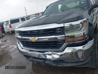 2016 Chevrolet Silverado 1500 LT with VIN 1GCVKREH3GZ233606, listed as a IAAI auction lot 42111728 with 90,449 mi miles and . Bid and sale history available at DreamBid. Image 12.
