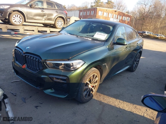 2022 BMW X6 xDrive40i with VIN 5UXCY6C01N9K27445, listed as a IAAI auction lot 41295221 with 28,328 mi miles. Bid and sale history available at carsss.com. Image 2.
