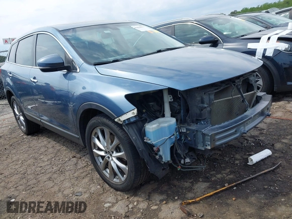 2014 Mazda CX-9 Grand Touring with VIN JM3TB2DA7E0427423, listed as a IAAI auction lot 42006817 with 95,248 mi miles and . Bid and sale history available at DreamBid. Image 1.
