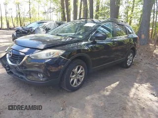 2014 Mazda CX-9 Touring with VIN JM3TB3CV1E0428688, listed as a IAAI auction lot 42052151 with 208,050 mi miles and . Bid and sale history available at DreamBid. Image 17.