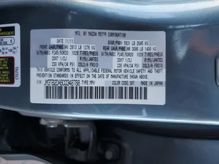 2012 Mazda CX-9 Grand Touring z VIN JM3TB2DA6C0348788, wystawiony jako Copart lot #52444915 z przebiegiem 130 392 mil mil oraz Szkoda całkowita • Salvage title. Historia ofert i sprzedaży dostępna na DreamBid. Obrazek 13.