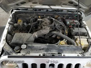 2008 Jeep Wrangler X с VIN 1J4FZ24138L526514, выставлен на аукционе Copart как лот 72569194 с пробегом 216 928 миль миль и Списание • Salvage title. История ставок и продаж доступна на DreamBid. Изображение 11.