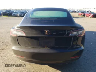 2019 Tesla Model 3 Mid Range with VIN 5YJ3E1EA6KF436152, listed as a Copart auction lot 50399265 with 62,676 mi miles and Salvage Title. Bid and sale history available at DreamBid. Image 6.