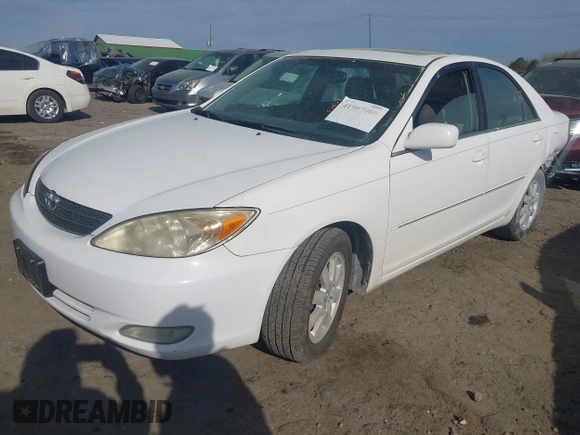 2003 Toyota Camry LE with VIN 4T1BE32K33U249945, listed as a IAAI auction lot 41907000 with 279,723 mi miles and . Bid and sale history available at DreamBid. Image 2.