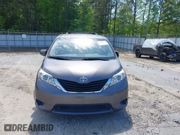 2014 Toyota Sienna LE AAS with VIN 5TDKK3DC4ES431664, listed as a IAAI auction lot 42081429 with 208,505 mi miles and . Bid and sale history available at carsss.com. Image 6.