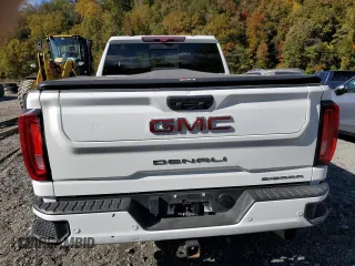 2022 GMC Sierra 3500HD Denali z VIN 1GT49WEYXNF282368, wystawiony jako Copart lot #76686364 z przebiegiem 63 832 mil mil oraz Szkody całkowita. Historia ofert i sprzedaży dostępna na DreamBid. Obrazek 6.
