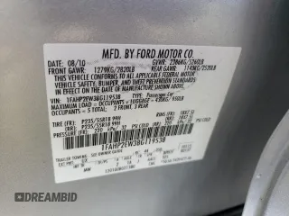 2011 Ford Taurus SEL z VIN 1FAHP2EW3BG119538, wystawiony jako Copart lot #54734985 z przebiegiem 53 753 mil mil oraz Szkoda całkowita • Salvage title. Historia ofert i sprzedaży dostępna na DreamBid. Obrazek 12.