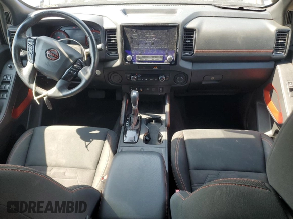 2022 Nissan Frontier Pro-X with VIN 1N6ED1EJ5NN610792, listed as a Copart auction lot 59897795 with 51,214 mi miles and Salvage title. Bid and sale history available at DreamBid. Image 8.
