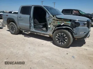 2024 Nissan Frontier PRO-4X with VIN 1N6ED1EK9RN600720, listed as a Copart auction lot 67608184 with 23,662 mi miles and Salvage Title. Bid and sale history available at carsss.com. Image 4.