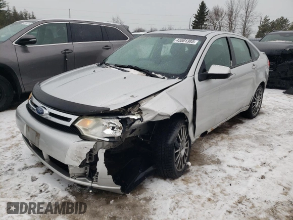 2009 Ford Focus SES with VIN 1FAHP36N19W214689, listed as a Copart auction lot 43001385 with 295,859 mi miles and Salvage Title. Bid and sale history available at carsss.com. Image 1.
