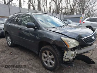 2004 Lexus RX 330 with VIN JTJHA31U740055969, listed as a IAAI auction lot 42039307 with 168,336 mi miles. Bid and sale history available at carsss.com. Image 1.