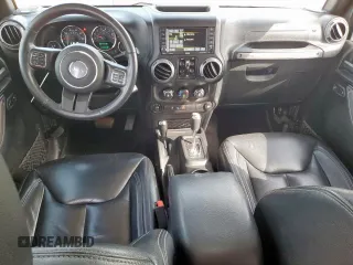 2017 Jeep Wrangler Unlimited Sport with VIN 1C4HJWDG6HL627015, listed as a Copart auction lot 63864755 with 113,443 mi miles and Salvage title. Bid and sale history available at DreamBid. Image 8.